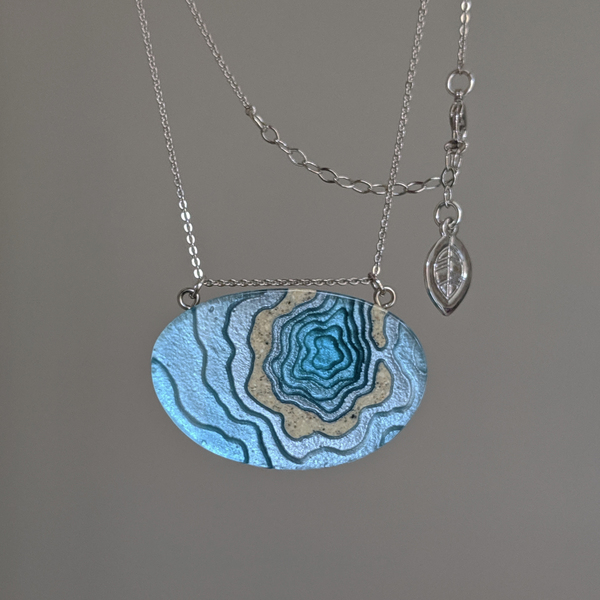 Atoll beach necklace grey background