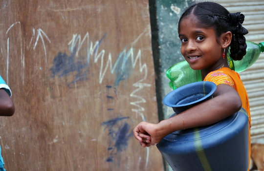 Girl carrying water