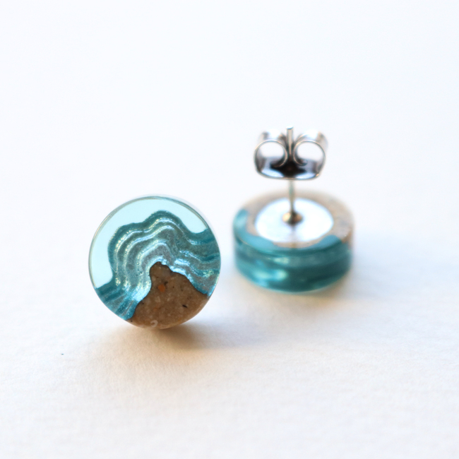 Shoal ear studs on white background showing transparency